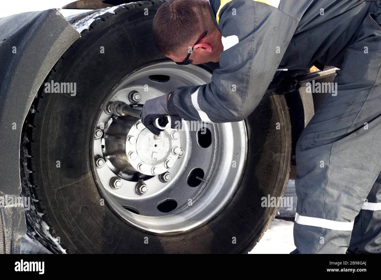 Truck wheel repair on the road Stock Photo Alamy