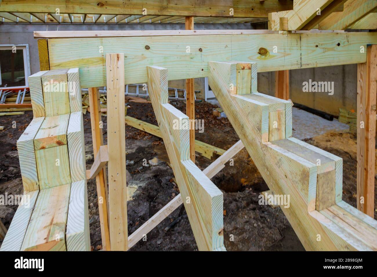 Installing deck patio construction. boards with above ground deck Stock  Photo - Alamy