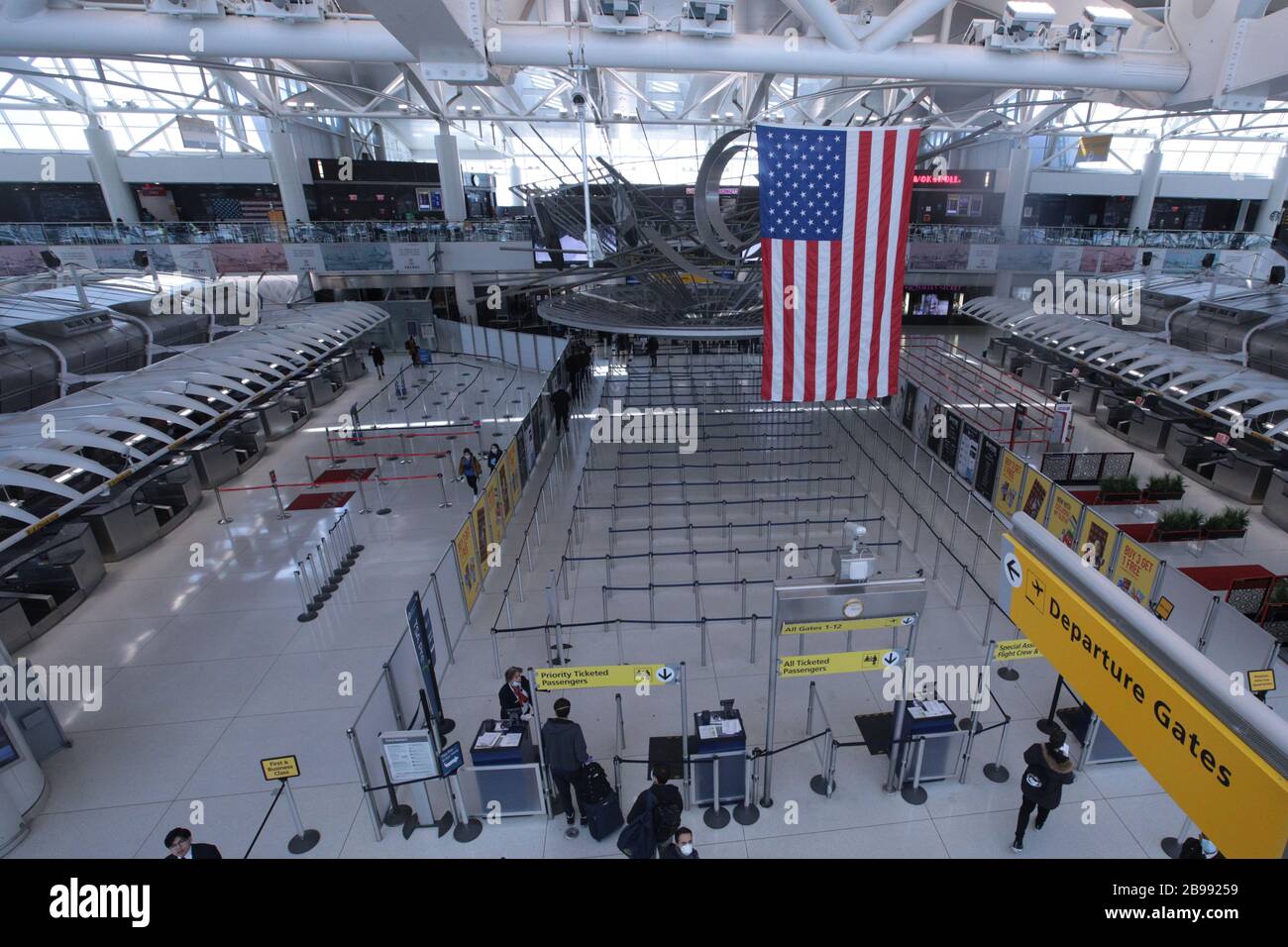 March 21, 2020, New York, NY, USA: Mar 21, 2020:  JFK airport and other nearby airport went ''ATC Zero'' resulting in a suspension of all departing flights. All approcahing flights were sent back to their origins.  The suspension only lasted a short time. Inside Terminal 1 at JFK airport. The TSA security line area  is almost empty. ...NEW YORK DAILY WEBSITES AND  PUBLICATIONS OUT! (Credit Image: © Dan Herrick/ZUMA Wire) Stock Photo