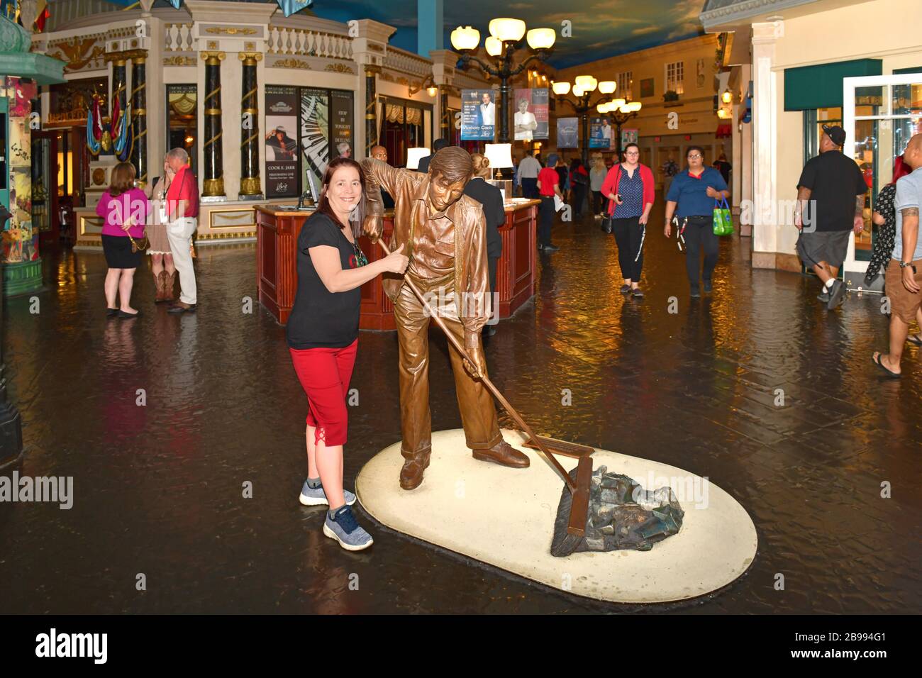 Picture/Photo: Man and woman standing on plaza inside Paris casino. Las  Vegas, Nevada, USA