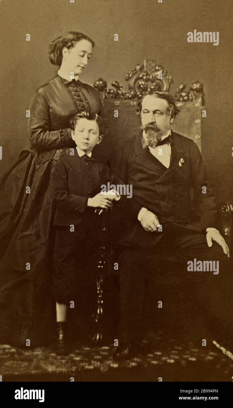 1864 ca, FRANCE : The french Emperor NAPOLEON III (  1808 - 1873 ) with  Empress Eugenia Eugenie Montijo de Guzman ( 1826 - 1920 ) and son Prince Imperial  Eugéne Louis Napoléon ( 1856 - 1879 ). Portrait by Sergei Ludovich Levitskt ( 1819 - 1898 ), Paris. - REALI - royalty - nobili - nobiltà - Napoleone III - imperatore - baffi - moustache - ritratto - baffi - moustache - beard - barba - RISORGIMENTO  - family - famiglia - black dress - abito vestito nero - FASHION - MODA - OTTOCENTO - 800's - '800 ---  Archivio GBB Stock Photo