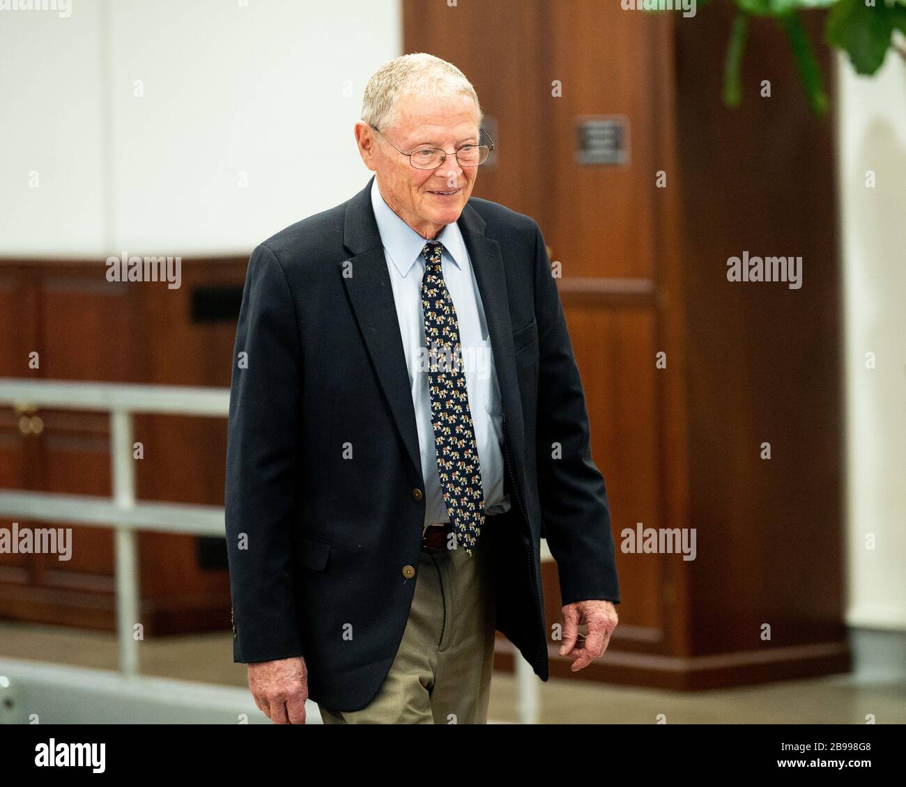 U.S. Senator James Inhofe (R-OK) walks towards the Senate Chamber. Stock Photo