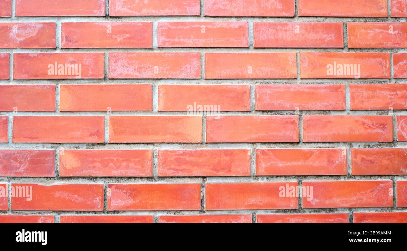 Old orange brick wall texture background Stock Photo - Alamy