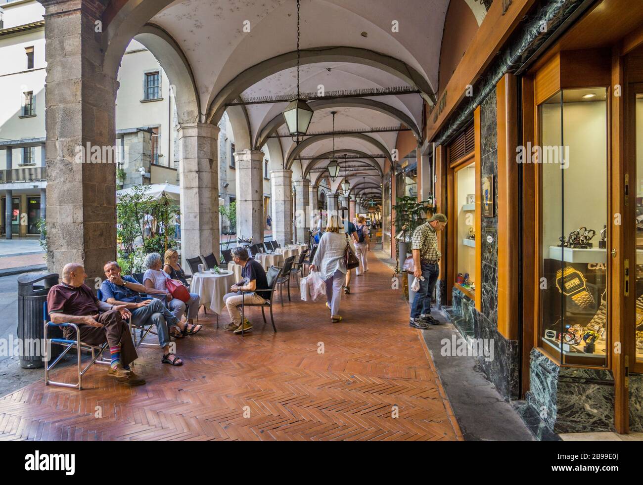 lined with cafes and shops, the arcaded Borgo Stretto a popular alleyway in the old parts of Pisa, Tuscany, Italy Stock Photo