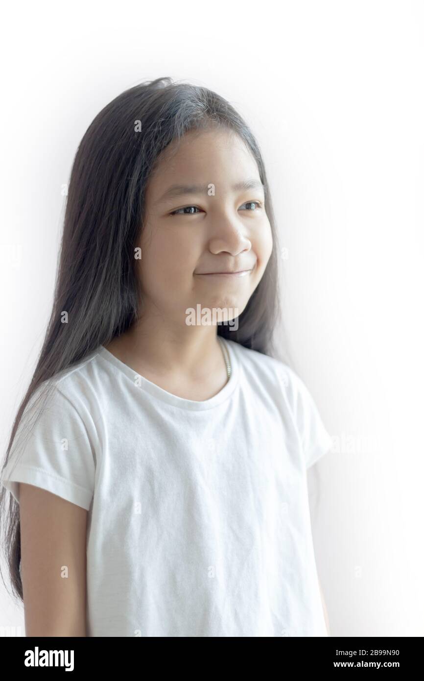 Portrait of smiling little girl on white backgrounds Stock Photo - Alamy
