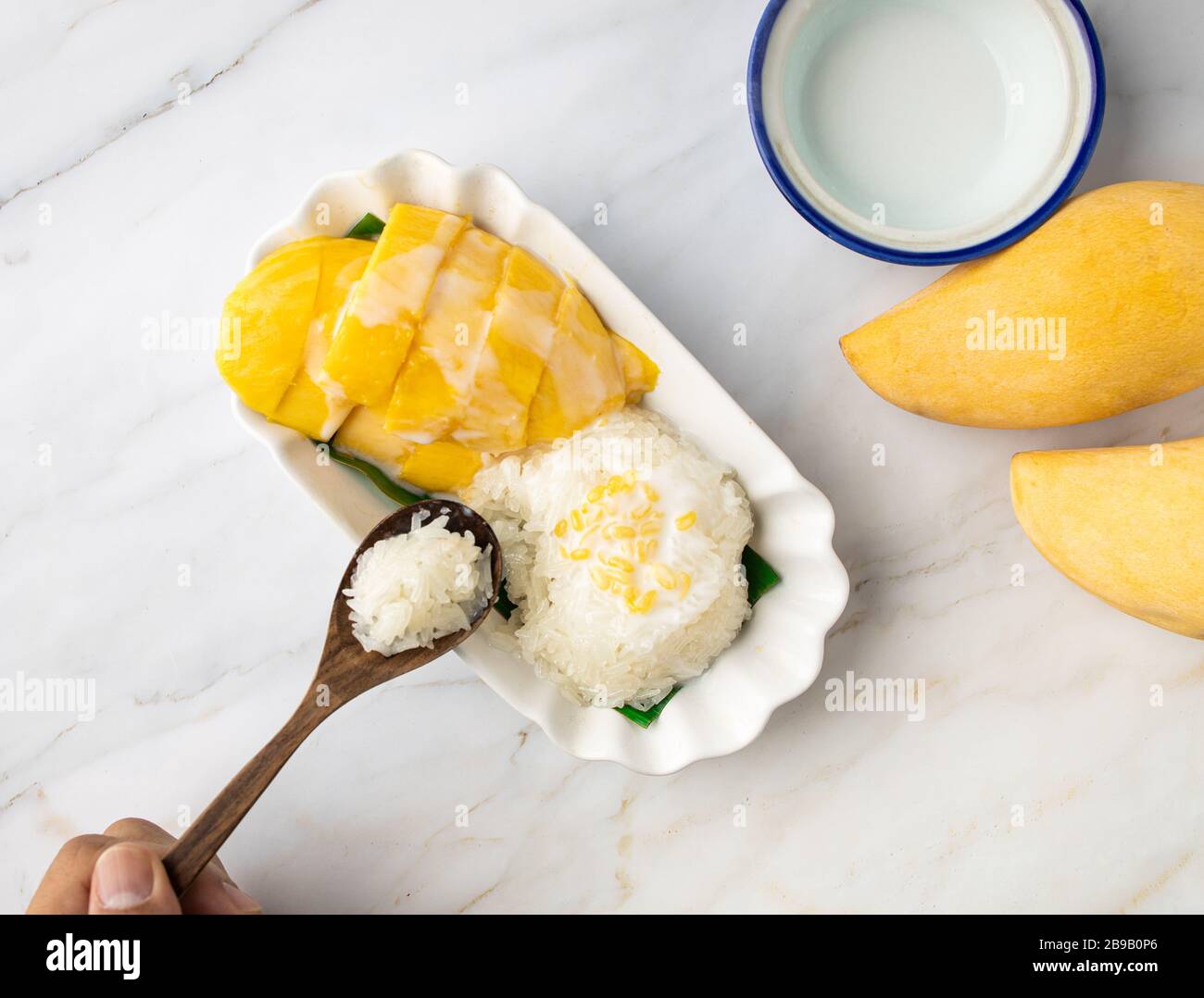 This is the picture of Mangoes Sticky Rice with Coconut Milk on Mable Stock Photo