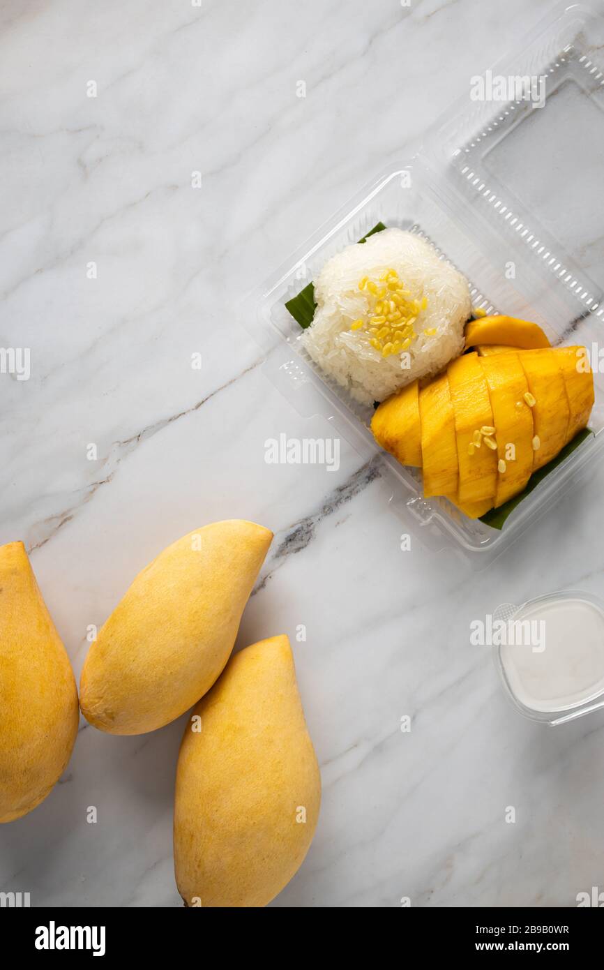 This is the picture of Mangoes Sticky Rice with Coconut Milk on Mable Stock Photo