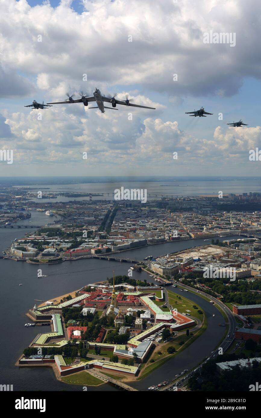 Tu-142MZ airplane with Su-33 jet fighters of the Russian Navy over Saint Petersburg, Russia. Stock Photo