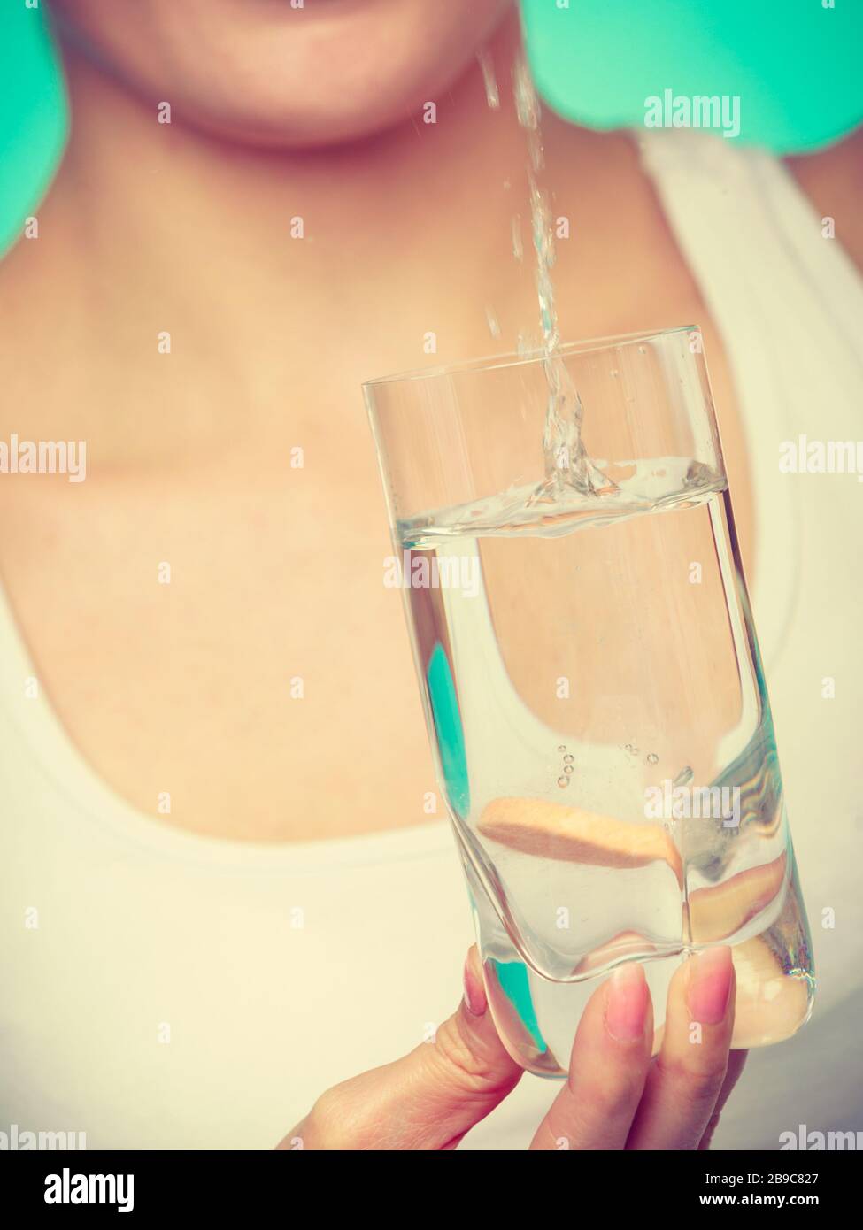 Vitamins, health, medicines. Woman throwing vitamin mineral supplement