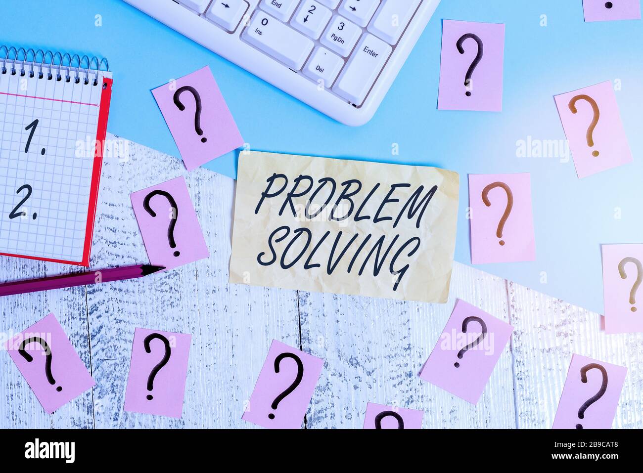 Writing note showing Problem Solving. Business concept for process of finding solutions to difficult or complex issues Writing tools and scribbled pap Stock Photo