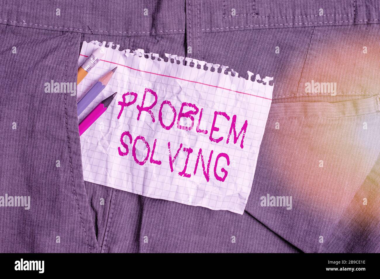 Writing note showing Problem Solving. Business concept for process of finding solutions to difficult or complex issues Writing equipment and white not Stock Photo