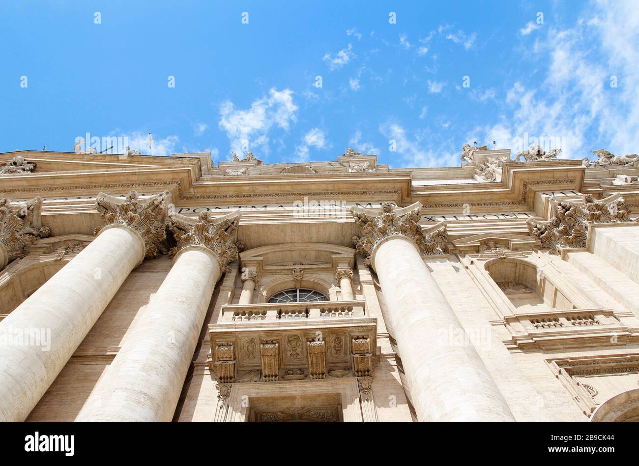 Facade decoration with big column and sculptures of St. Peter's ...