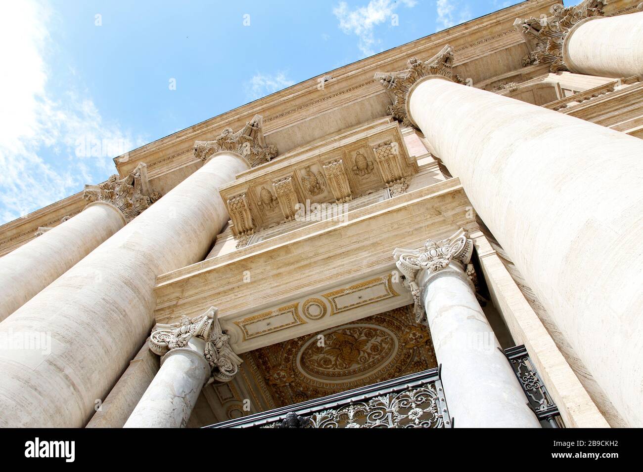 Facade decoration with big column and sculptures of St. Peter's ...