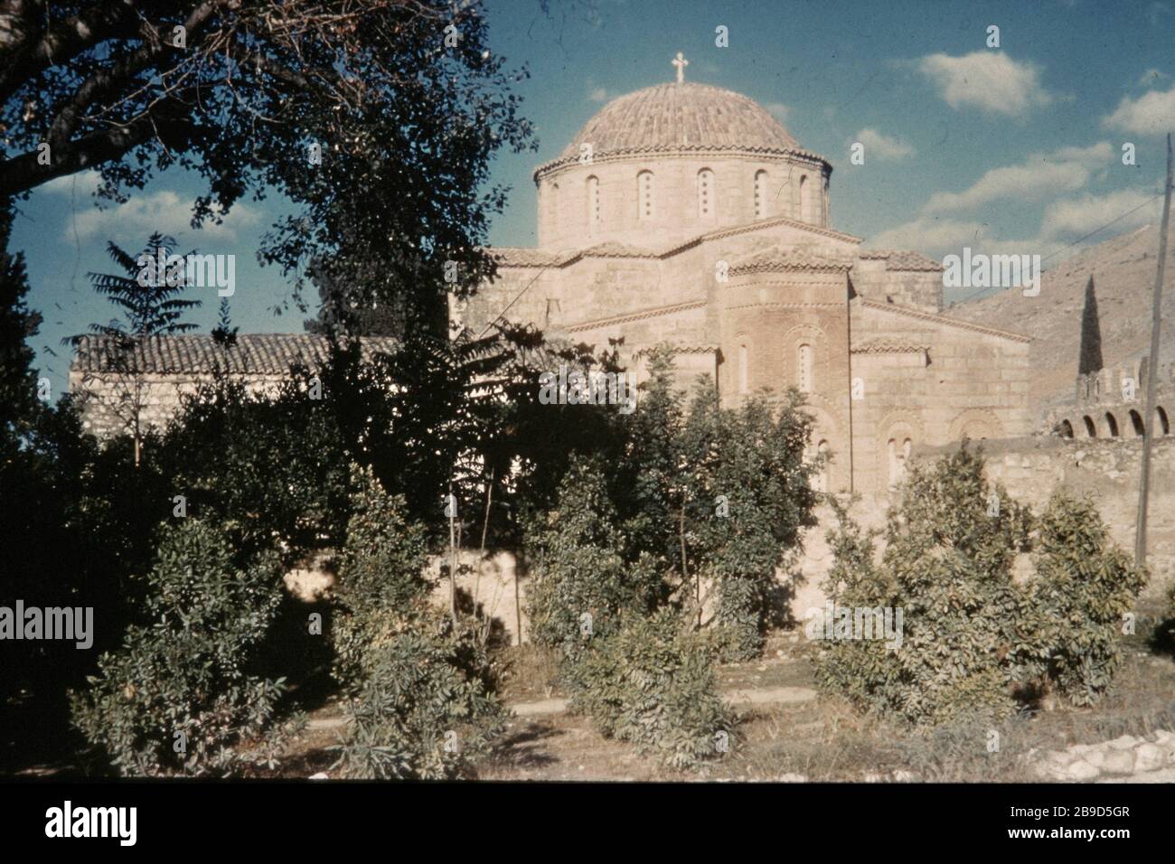 The monastery Daphni with garden near Athens. [automated translation] Stock Photo