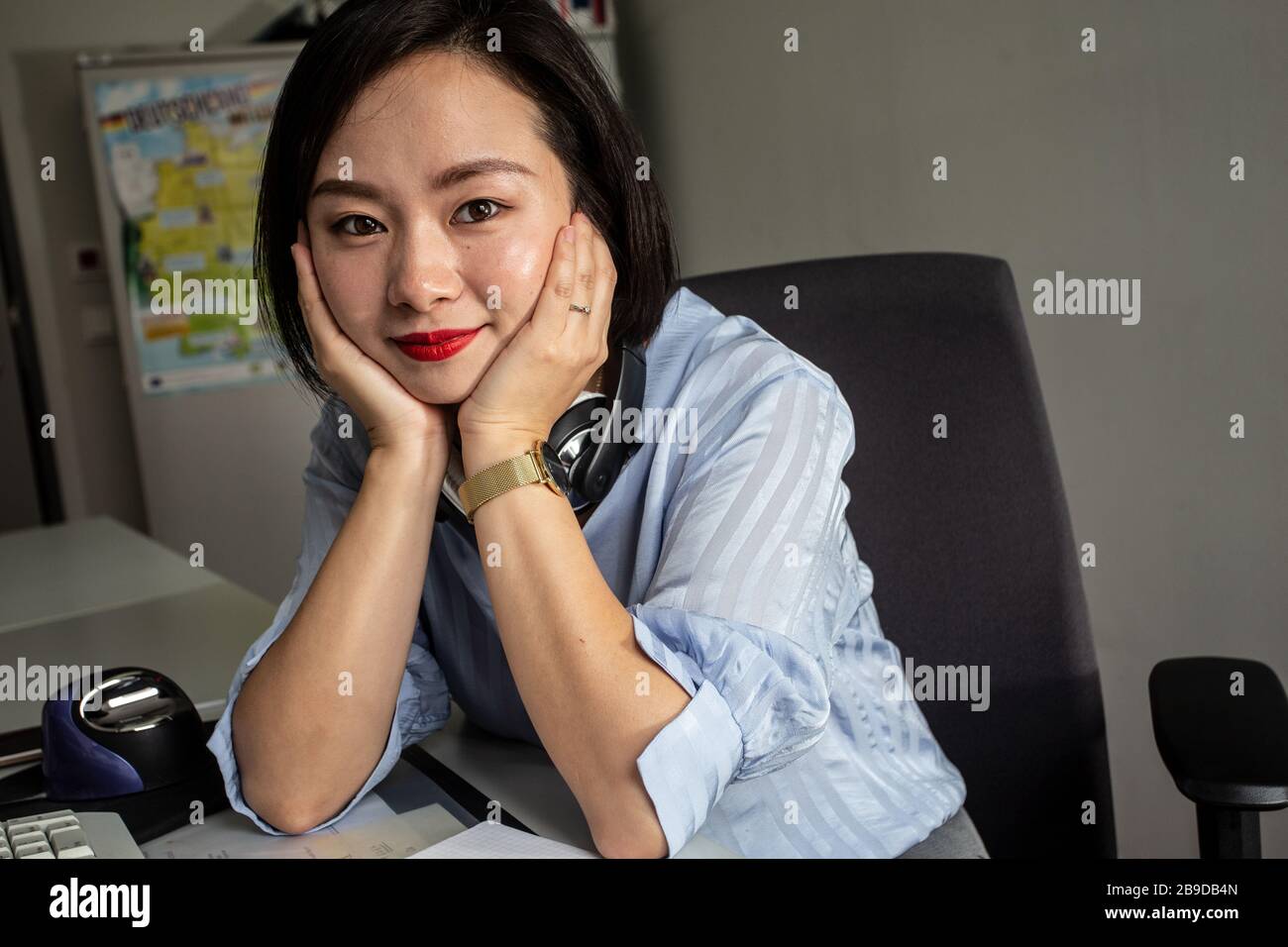 Young asian woman in headphone hi-res stock photography and images - Alamy