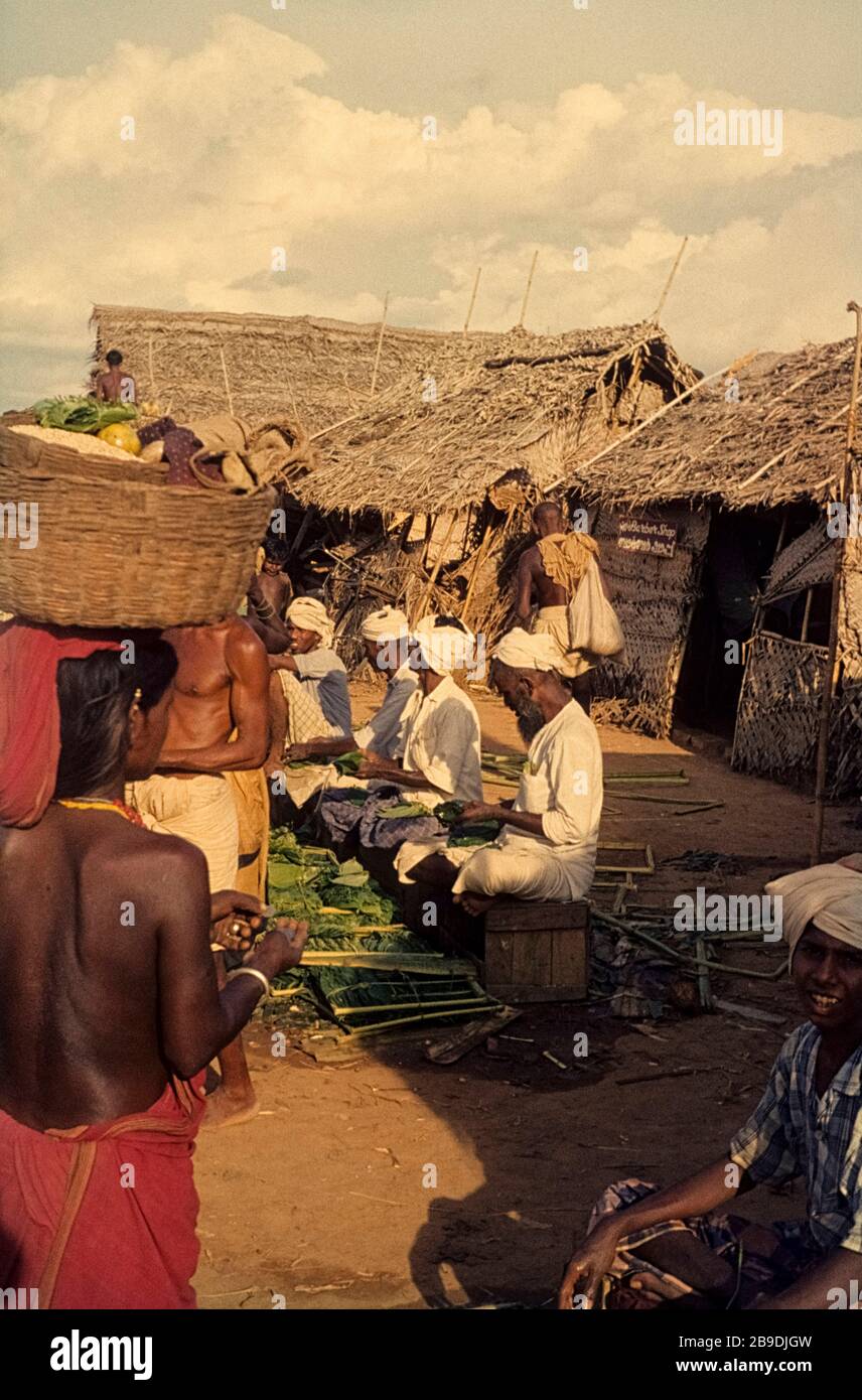 Street hawkers sell at a market near Neyveli Betel. [automated
