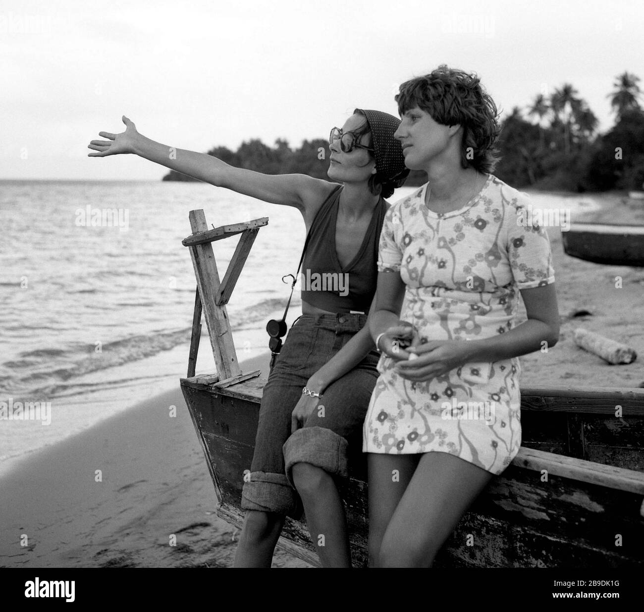 Two people in rowing boat Black and White Stock Photos & Images - Alamy