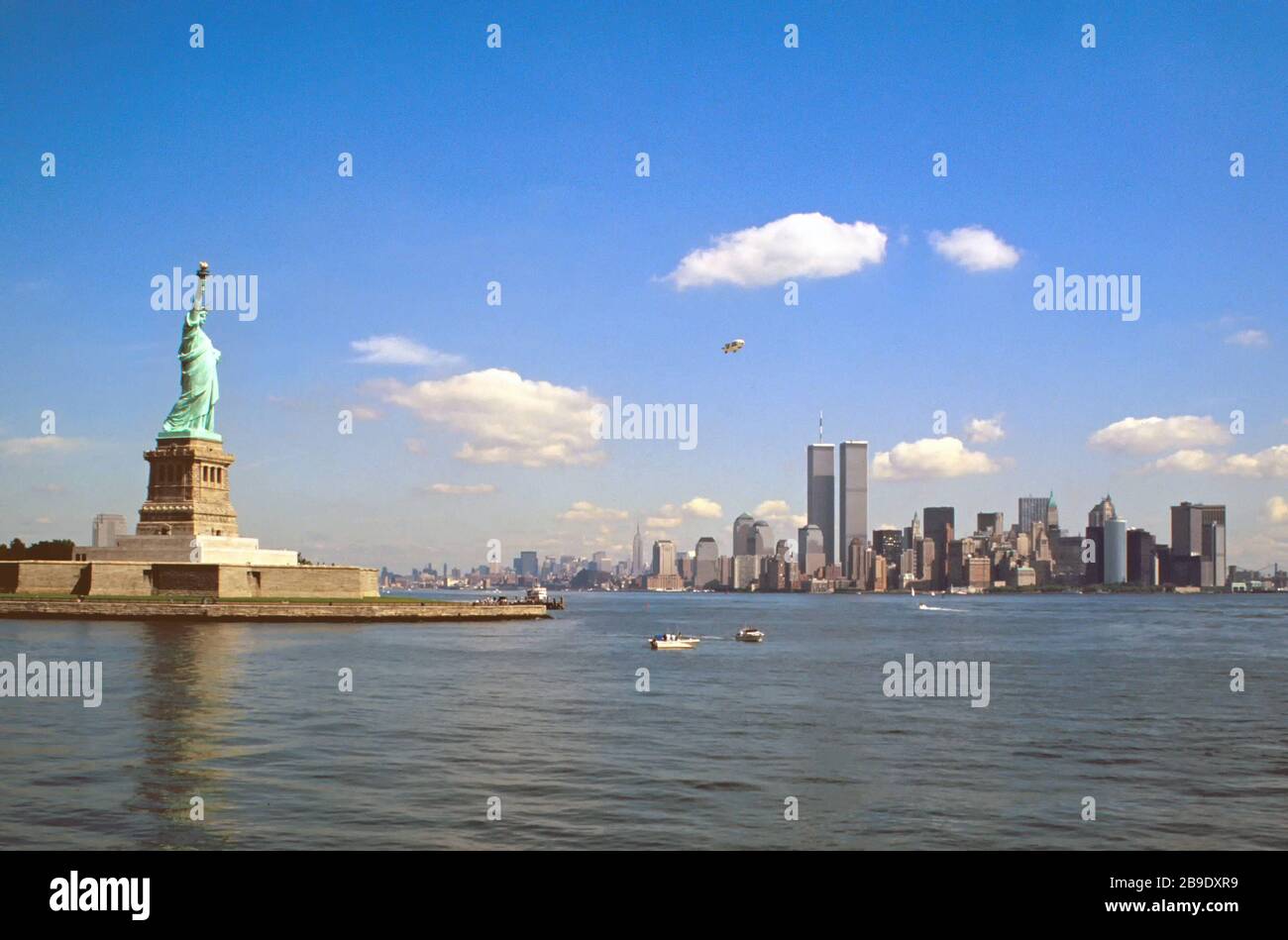 The Statue of Liberty with the skyline of Manhattan in the background