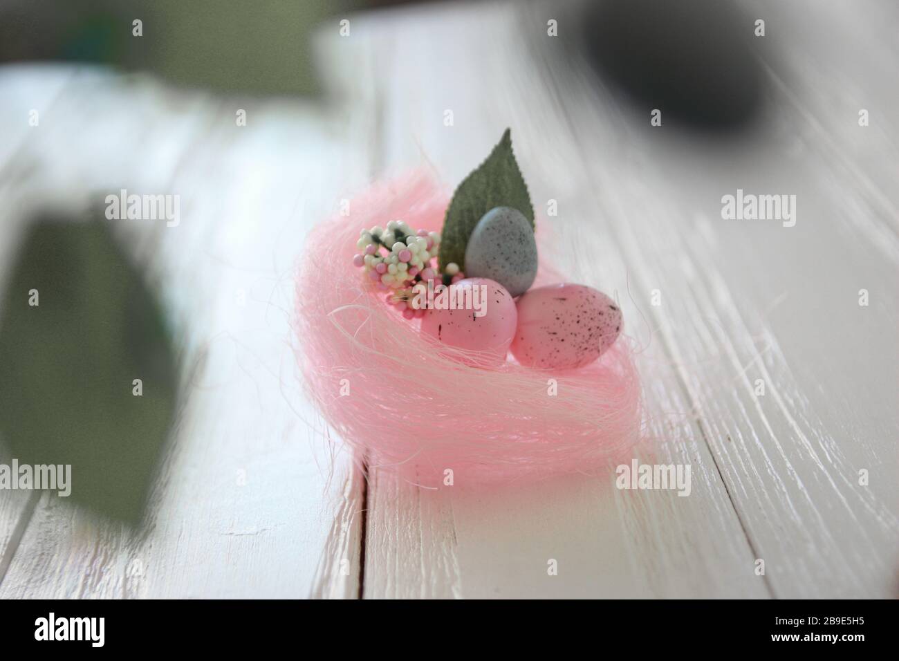 Congratulatory easter background. Easter eggs and flowers. Stock Photo