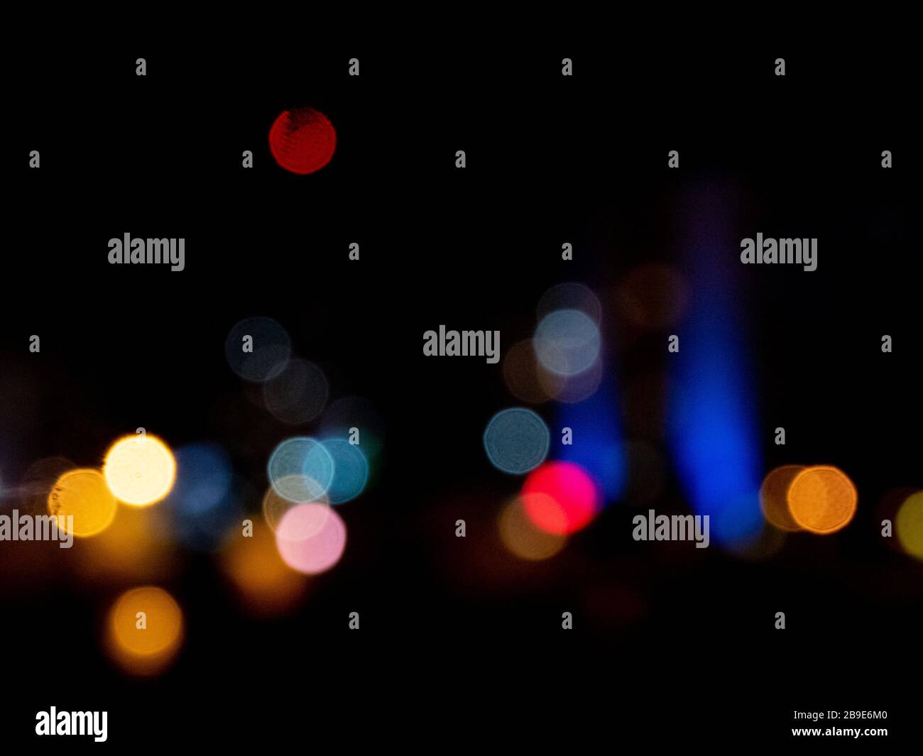 Defocused bokeh color lights abstract background. Colorful dots defocused background. Stock Photo