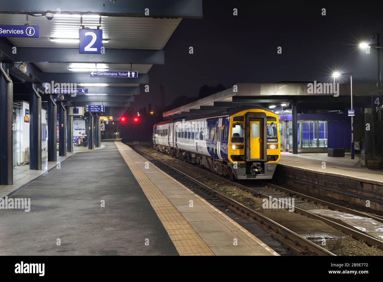 Northern rail class 158 sprinter train at Blackburn railway station at night Stock Photo