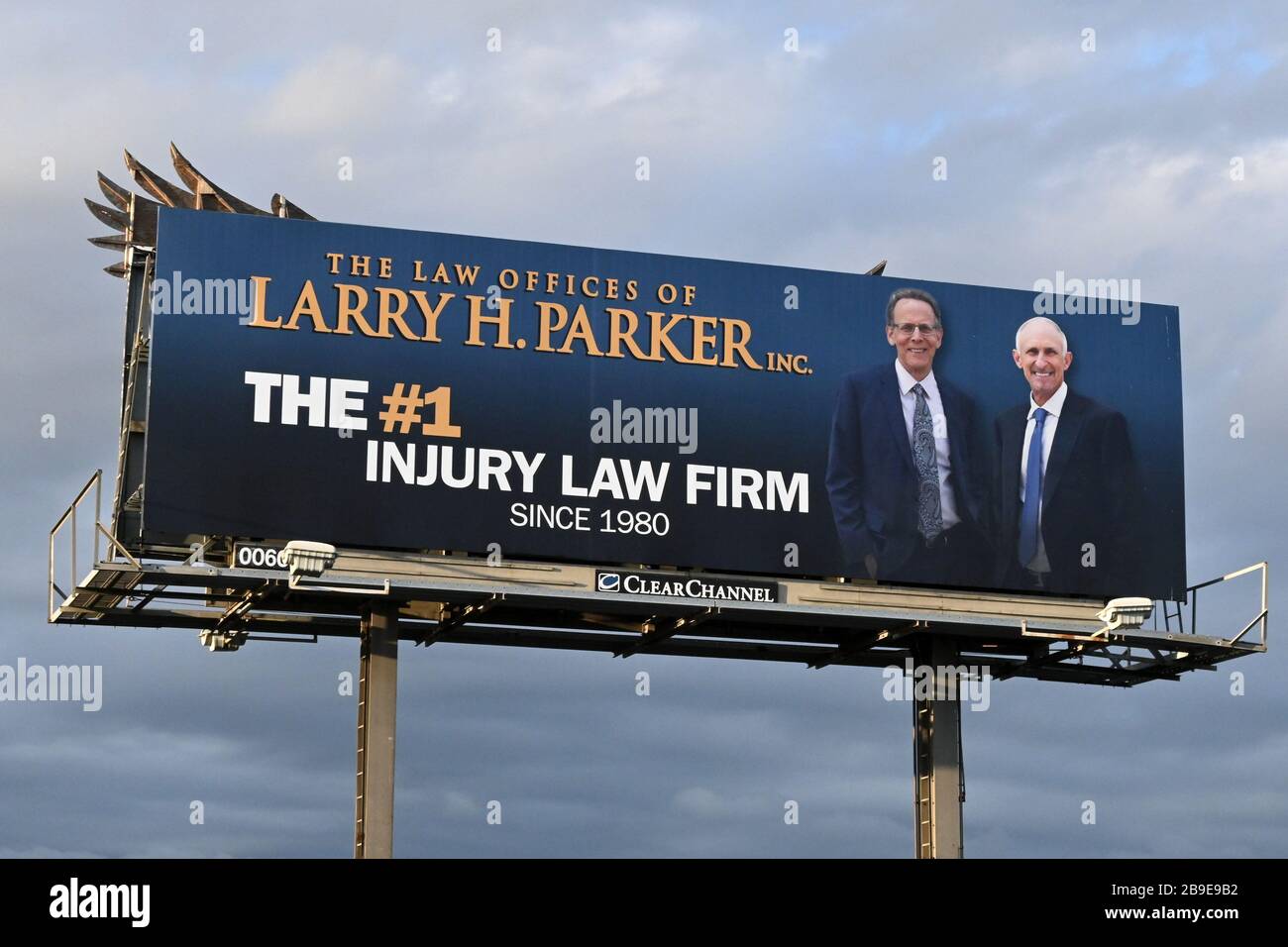 The Law Offices of Larry H. Parker billboard along the Interstate 710 North freeway amid the