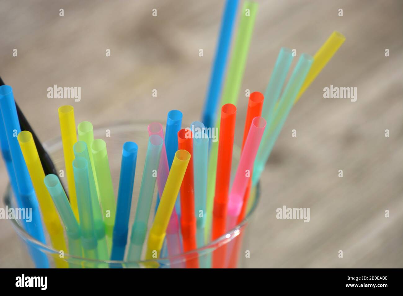 closeup of drinking straw with copy space, disposable plastic straws