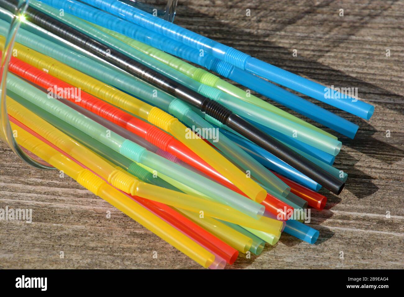 environmentally harmful drinking straws, lying plastic straw drink straws Stock Photo