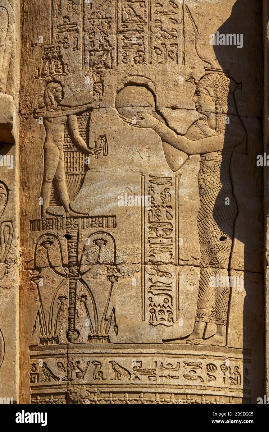 Hieroglyphic carvings in ancient temple Stock Photo