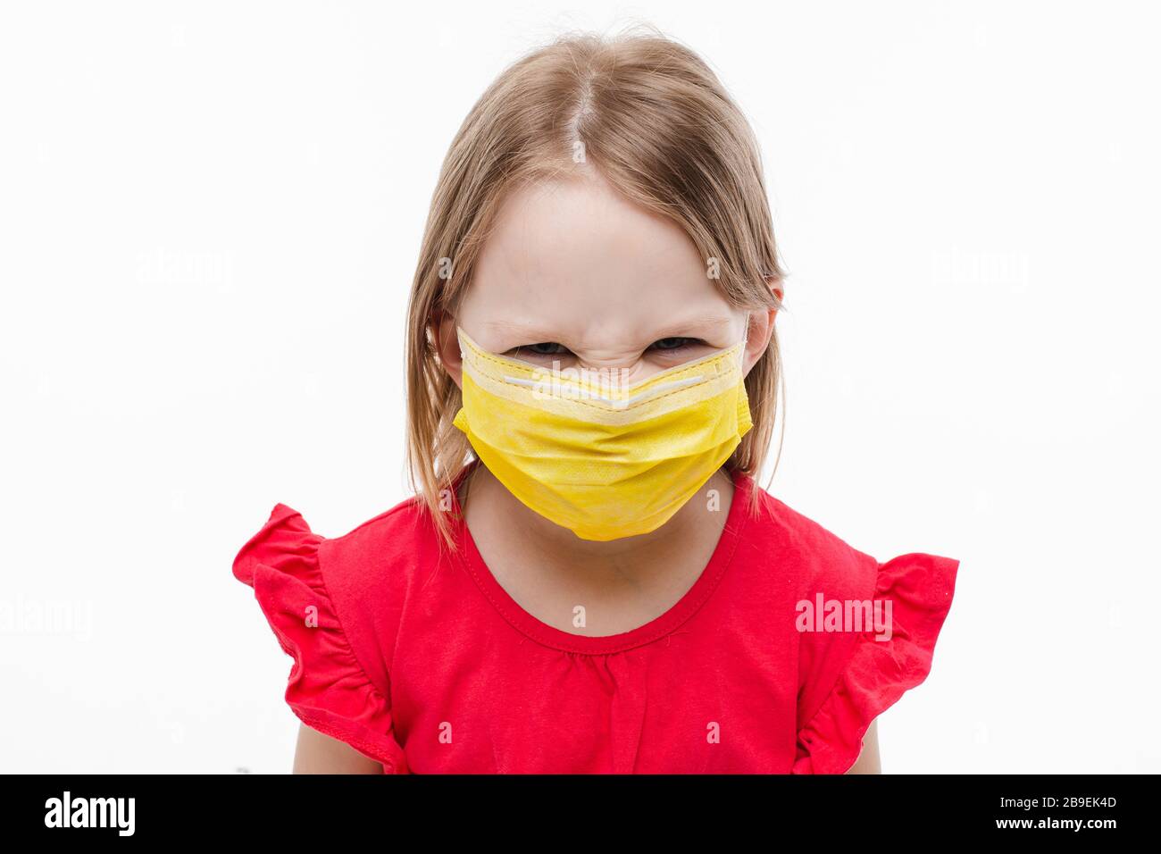 Download Portrait Of Little Girl With Yellow Medical Mask On Her Face Rages Isolated On White Background Stock Photo Alamy PSD Mockup Templates