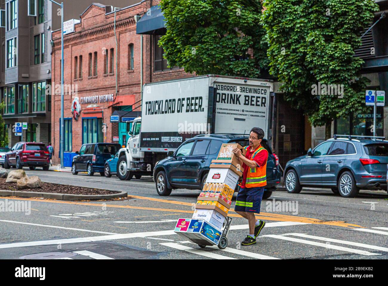 Man Delivering a Truckload of Beer Stock Photo