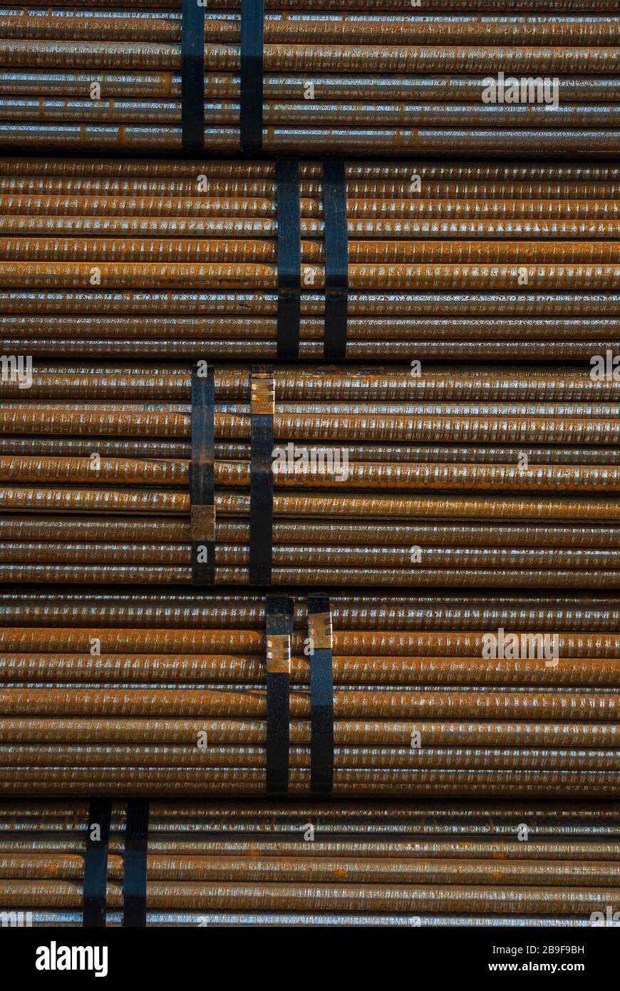Steel, round steel in outdoor stock, metal, raw material, stock, rod material Stock Photo
