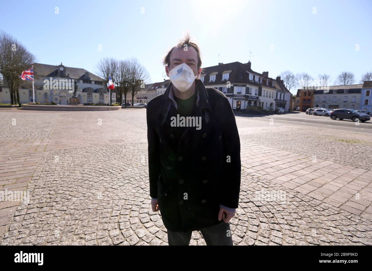 23 March 2020. Montreuil Sur Mer, Pas de Calais, France.  Coronavirus - COVID-19 in Northern France.  Local resident Frederic Philippe stands in the d Stock Photo