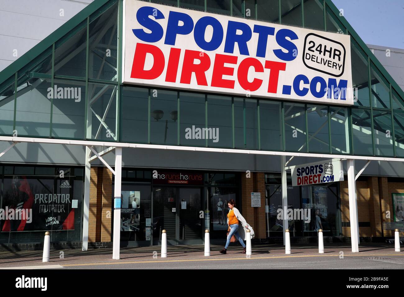 A view of a closed Sports Direct store at Wrekin Retail Park in Telford, the day after Prime Minister Boris Johnson put the UK in lockdown to help curb the spread of the coronavirus. Sports Direct has said it will close its stores in a major U-turn after initially calling for its workers to continue selling sports and fitness equipment in the face of coronavirus. Stock Photo