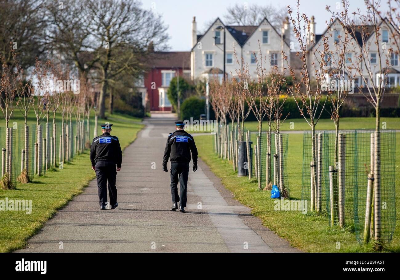 A couple of police officer walk through Stanley Park in Liverpool, the day after Prime Minister Boris Johnson put the UK in lockdown to help curb the spread of the coronavirus. PA Photo. Picture date: Tuesday March 24, 2020. See PA story HEALTH Coronavirus. Photo credit should read: Peter Byrne/PA Wire Stock Photo