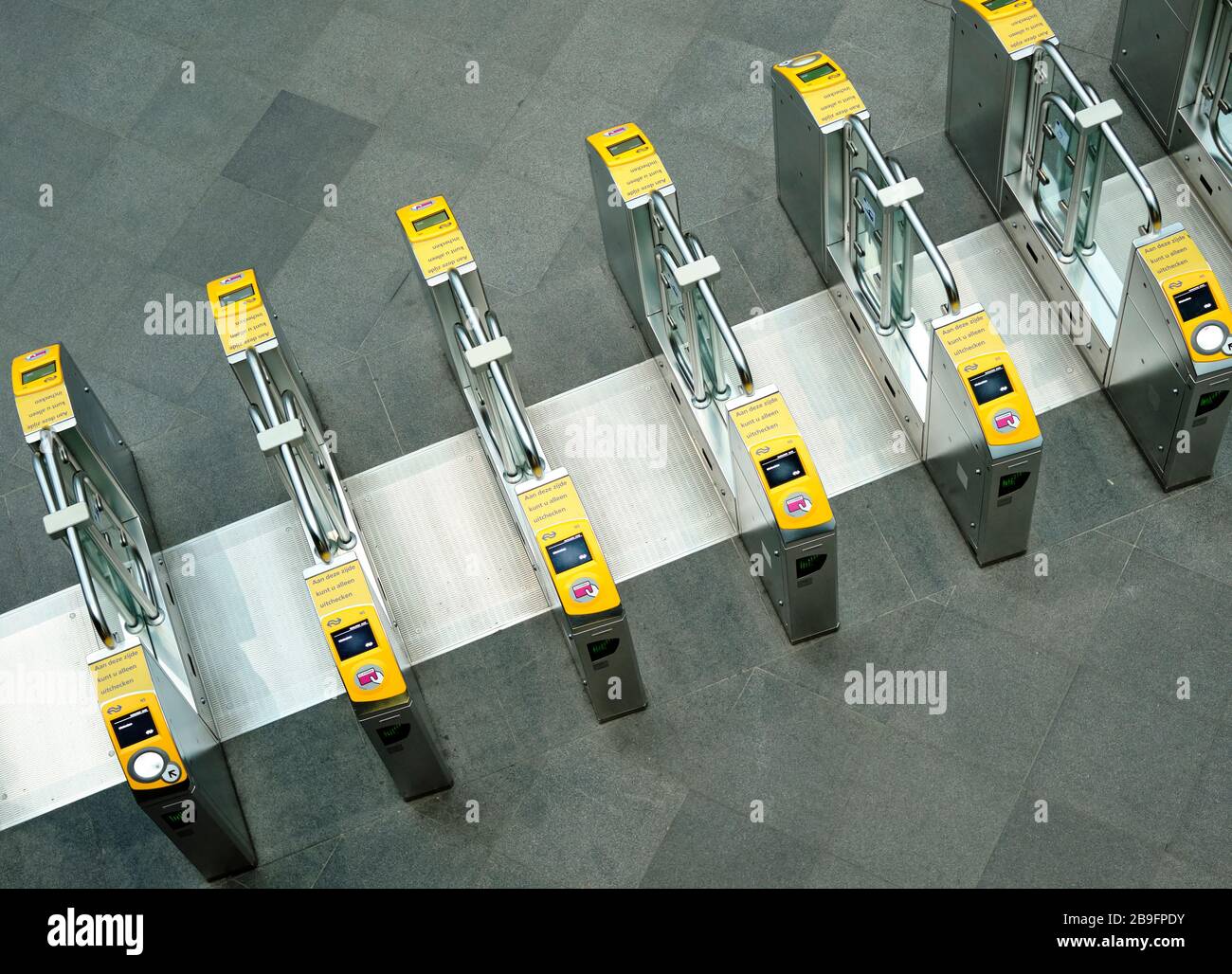 Acces gates where you can scan your card to get to the public transport facilities. Stock Photo