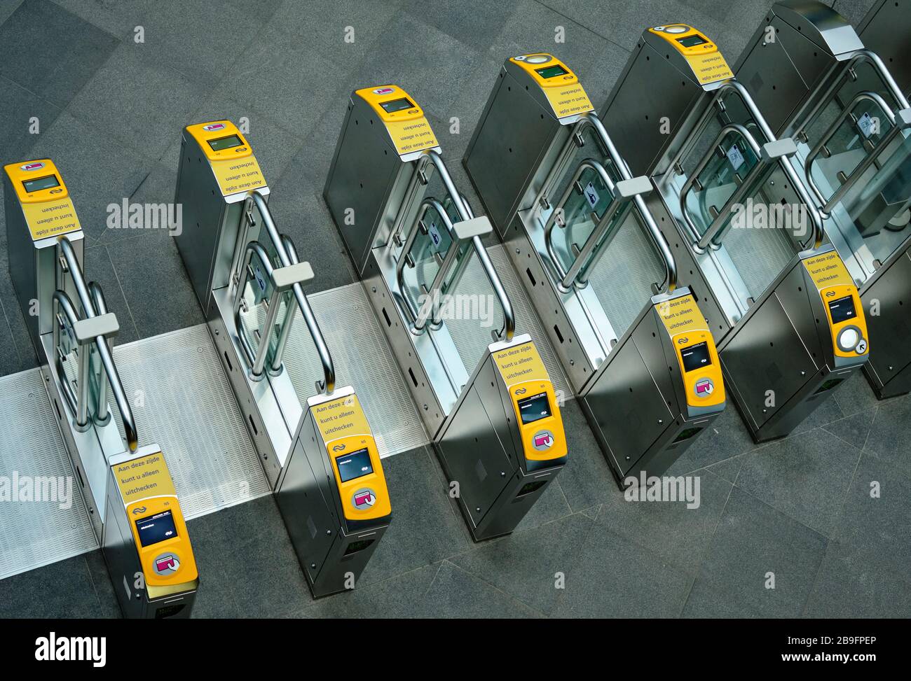 Acces gates where you can scan your card to get to the public transport facilities. Stock Photo