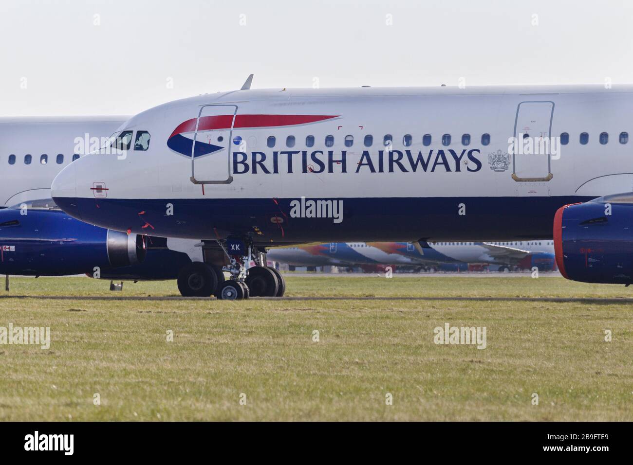 British Airways A320 family parked up at Glasgow Airport during the Coronavirus pandemic Stock Photo