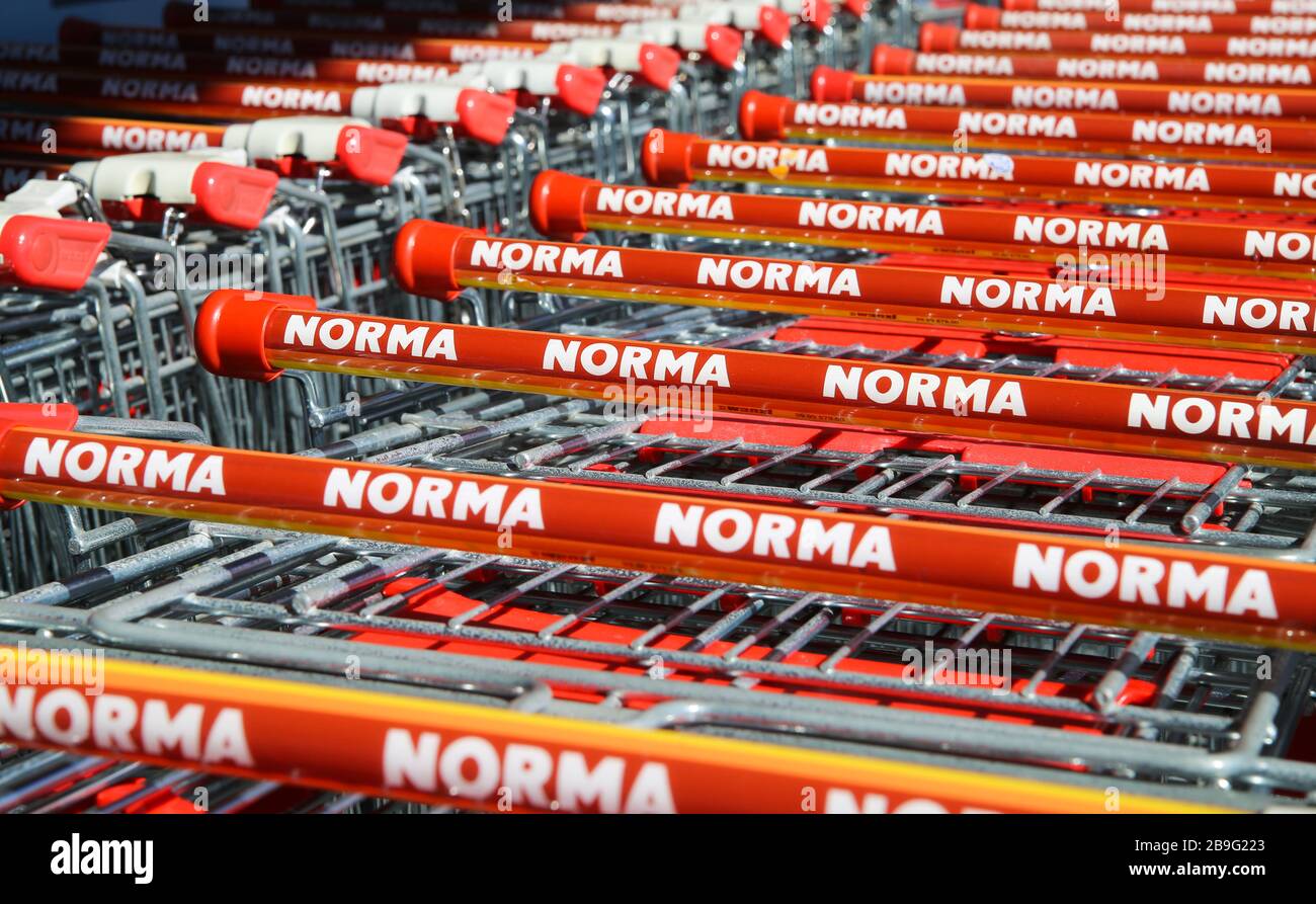 Heinsberg, Germany - March 23. 2020: Close up of isolated row shopping carts of german supermarket discounter chain Norma Stock Photo