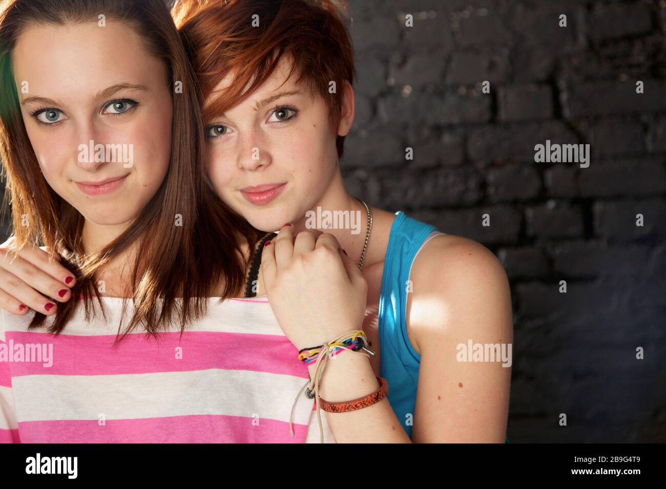 Portrait confident teenage girl friends Stock Photo