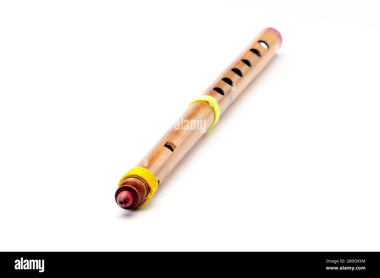 Bamboo wind instrument indian flute on isolated white background Stock Photo - Alamy Bamboo wind instrument indian flute on isolated white background Stock Photo - Alamy