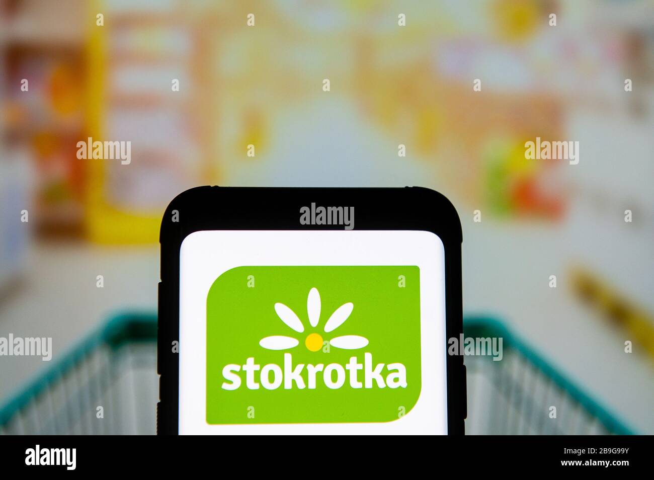 In this photo illustration a Stokrotka logo seen displayed on a smartphone. Stock Photo
