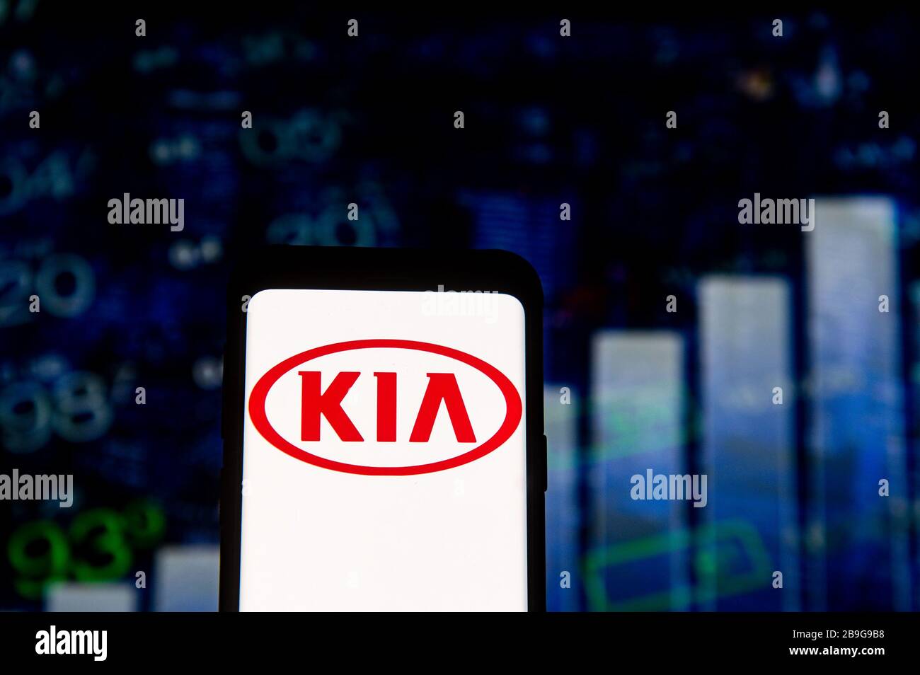 In this photo illustration a KIA logo seen displayed on a smartphone. Stock Photo