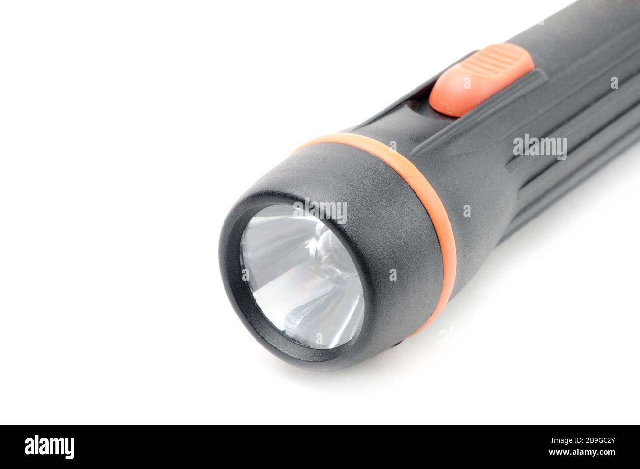 Flashlight in black on an isolated white background Stock Photo