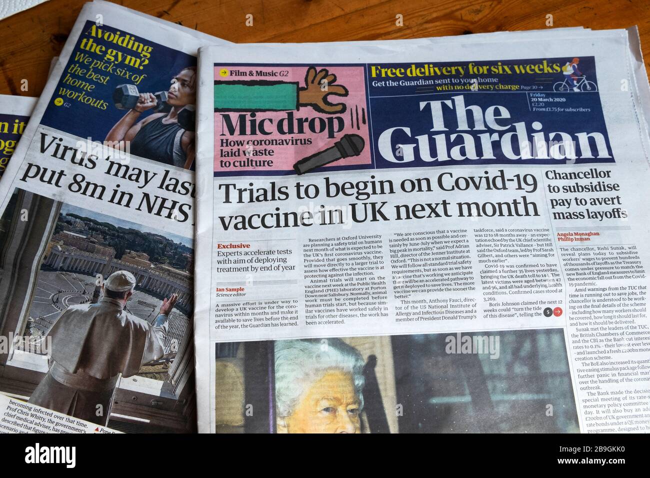 'Trials to begin on Covid-19 vaccine in UK next month' front page newspaper headline in the Guardian 20 March 2020 London England UK Stock Photo