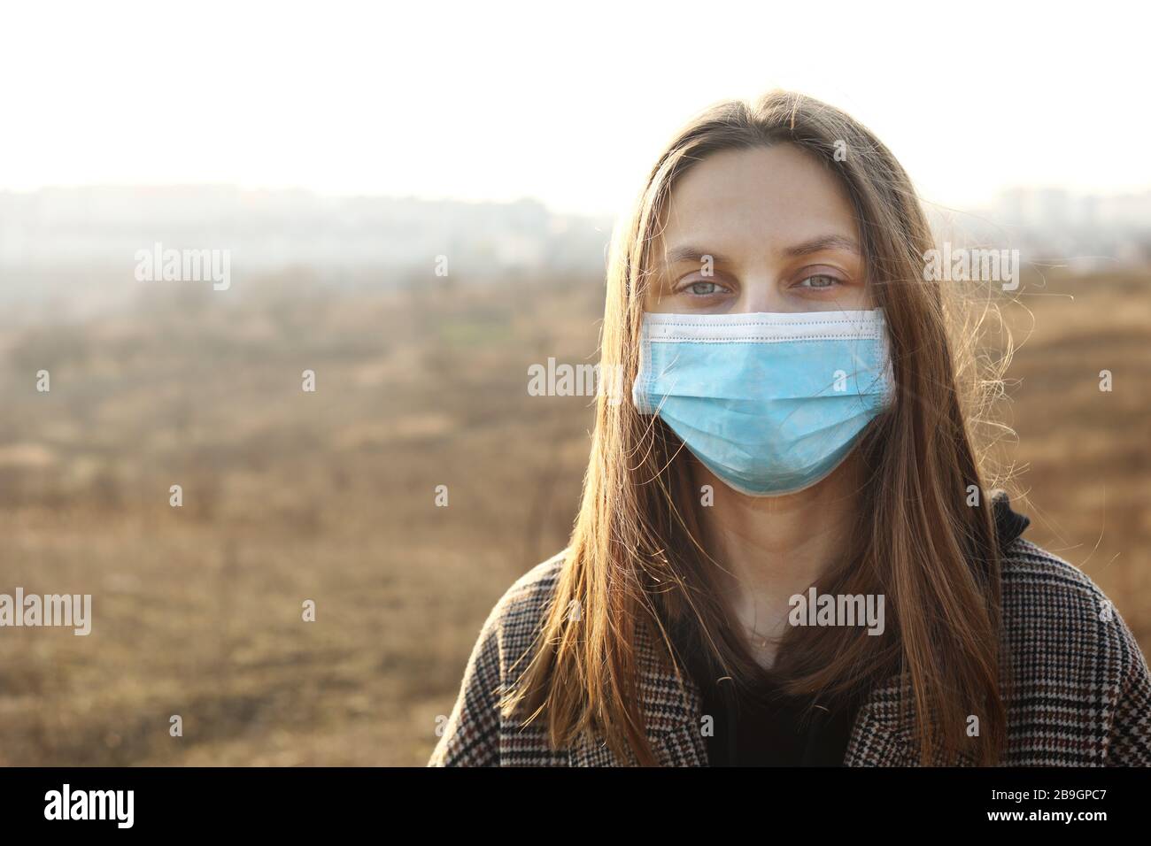 Close Up Of Photo Of A Woman Wearing Protective Mask Against Infectious close-up-of-photo-of-a-woman-wearing-protective-mask-against-infectious
