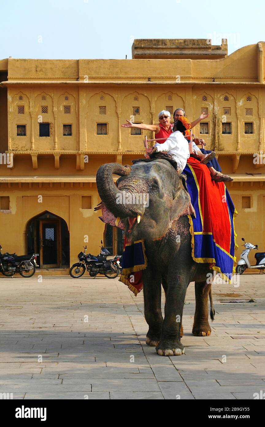 Jaipur, India - 11th November 2019:Tourists enjoying an Elephant ride ...