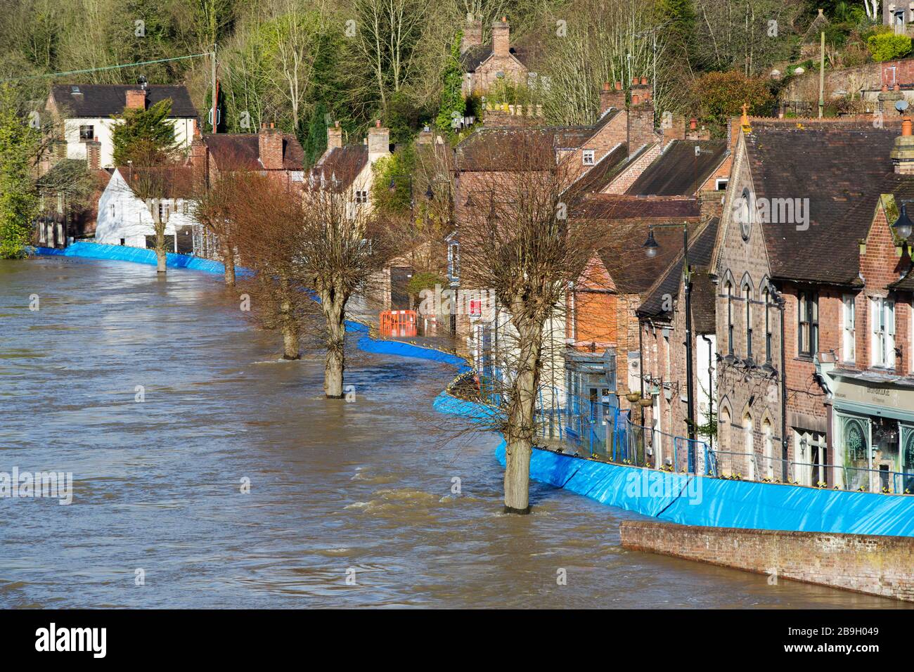 Flood barriers at Ironbridge in Shropshire, with the River Severn in ...