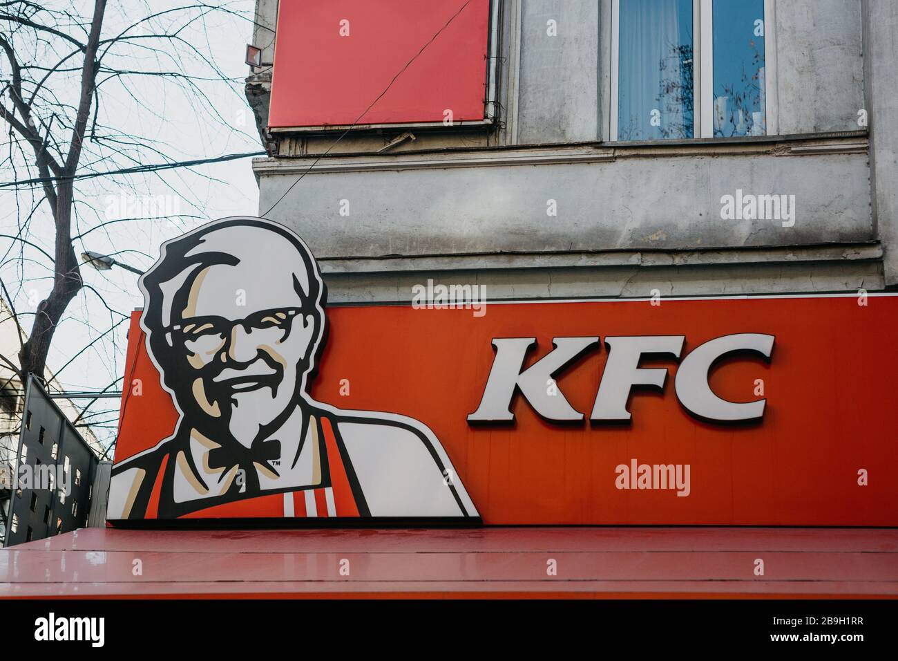 Georgia, Tbilisi, February 25, 2020: KFC sign at the entrance to a fast food restaurant - Kentucky fried chicken. Stock Photo