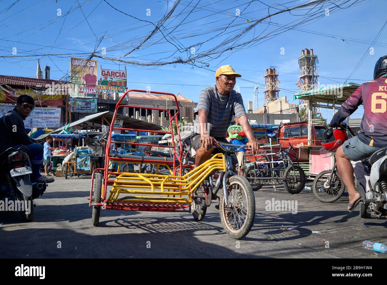 The Rickshaw Rider Rickshaw rider in the streets of the Carbon public market Stock Photo ...